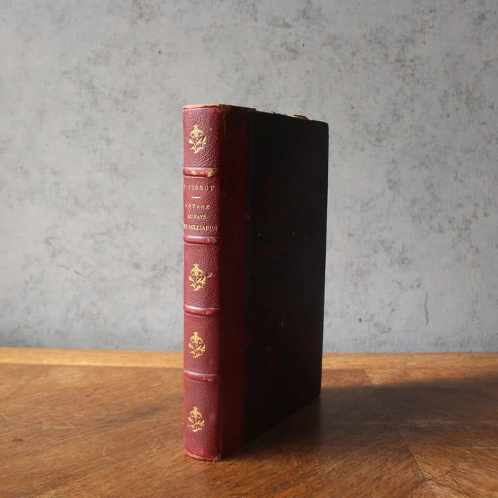 フランスの革装古書 フランス 1900年前後 TISSOT『Voyage au Pays des Milliards』の赤革背表紙
